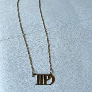 The tortured poets department necklace taylor swift